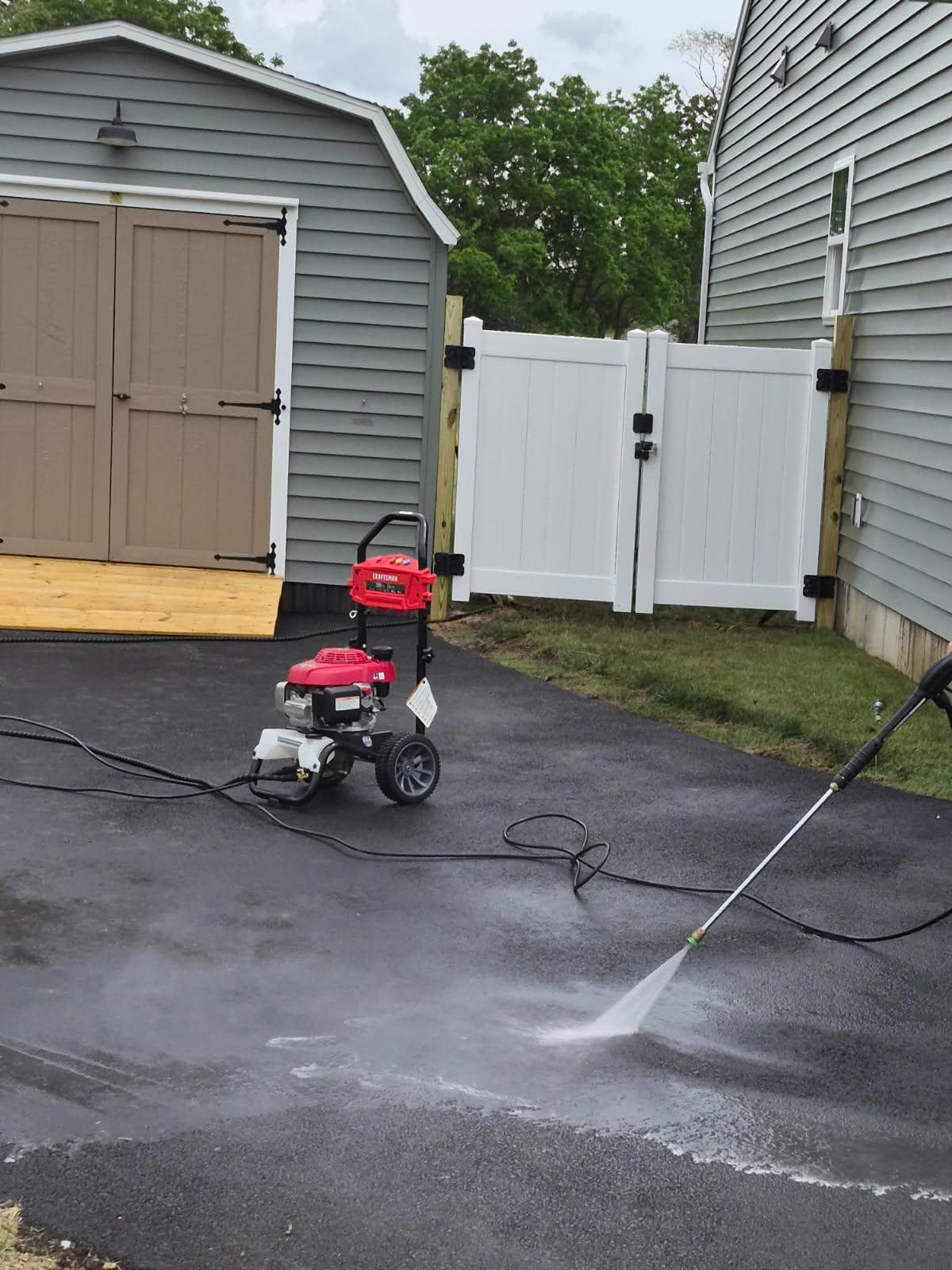 Gallery photos for Vinyl Double Gate Install and Driveway Pressure Wash: Image #1