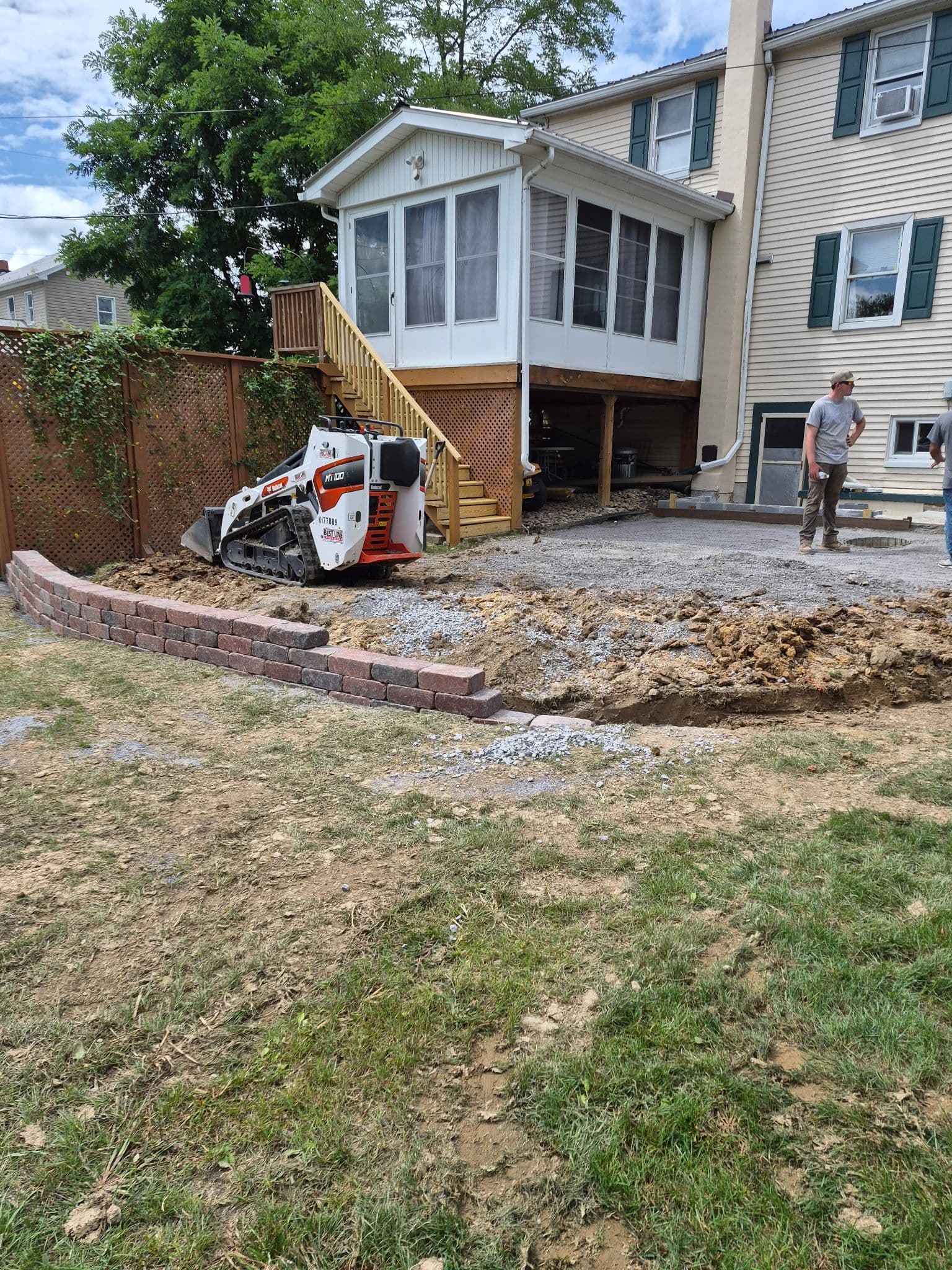 Retaining Wall Build to Lock In a Backyard Patio image