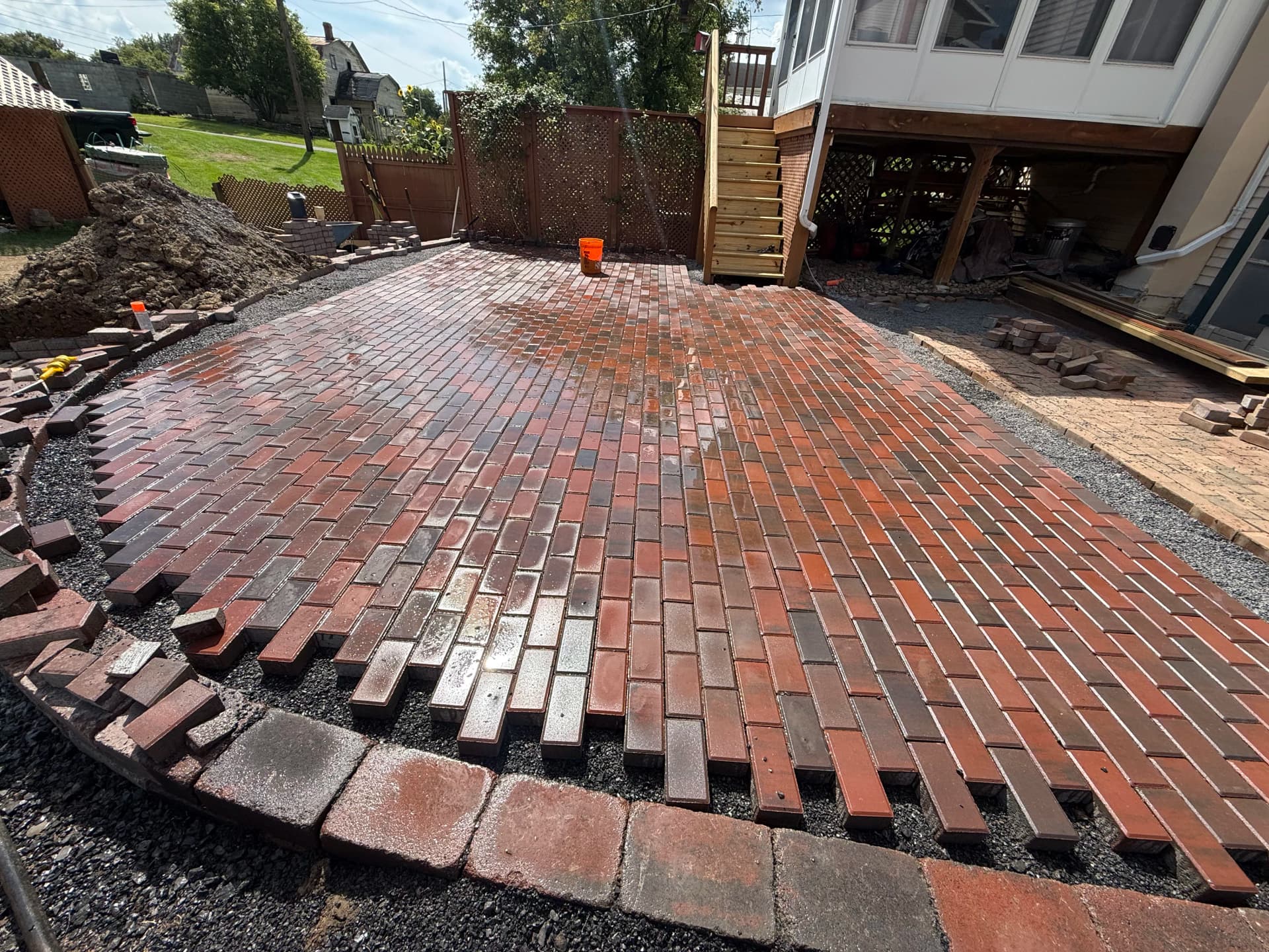 Brick Paver Patio Taking Shape in the Backyard image