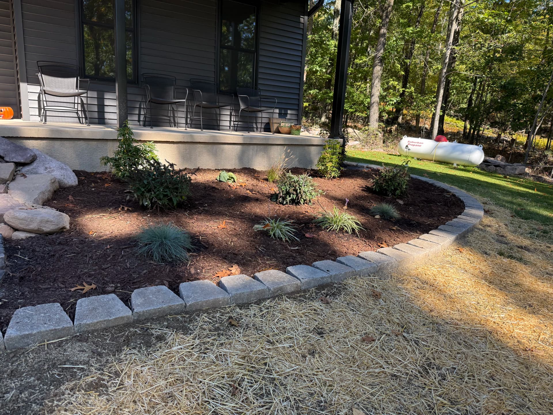 Paver Walkway, Steps, and Fresh Landscape Beds Up Front