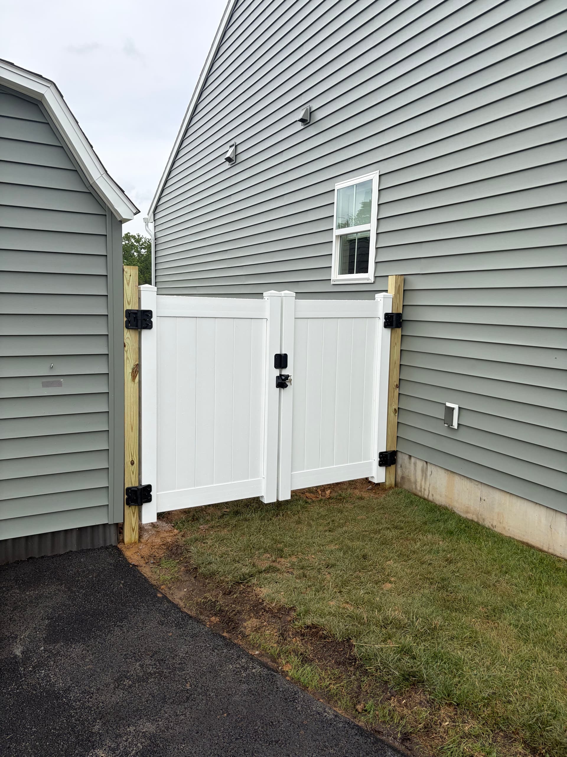 Gallery photos for Vinyl Double Gate Install and Driveway Pressure Wash: Image #2