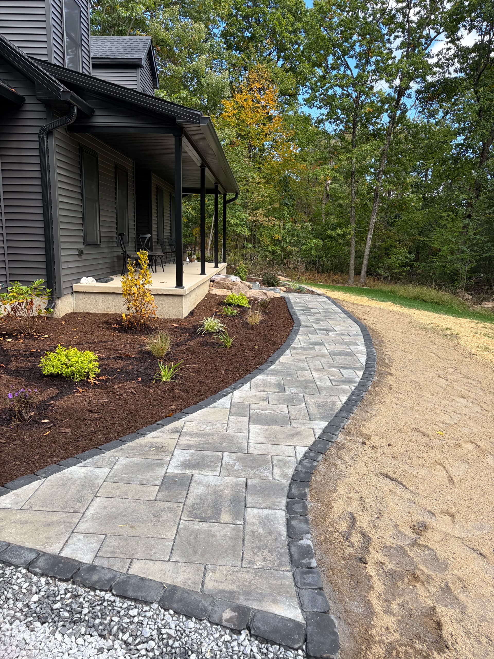 Paver Walkway, Steps, and Fresh Landscape Beds Up Front
