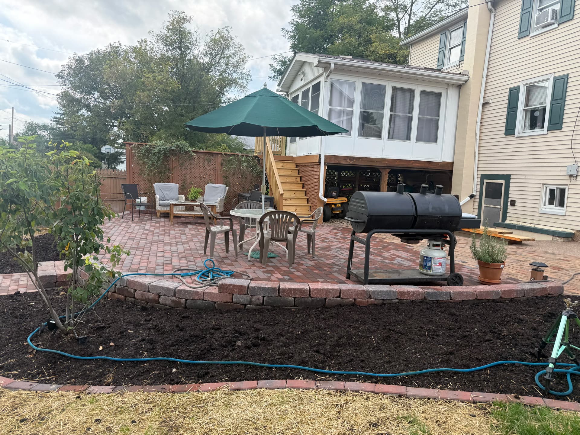 Gallery photos for Paver Patio With Retaining Wall and Fresh Planting Beds: Image #4