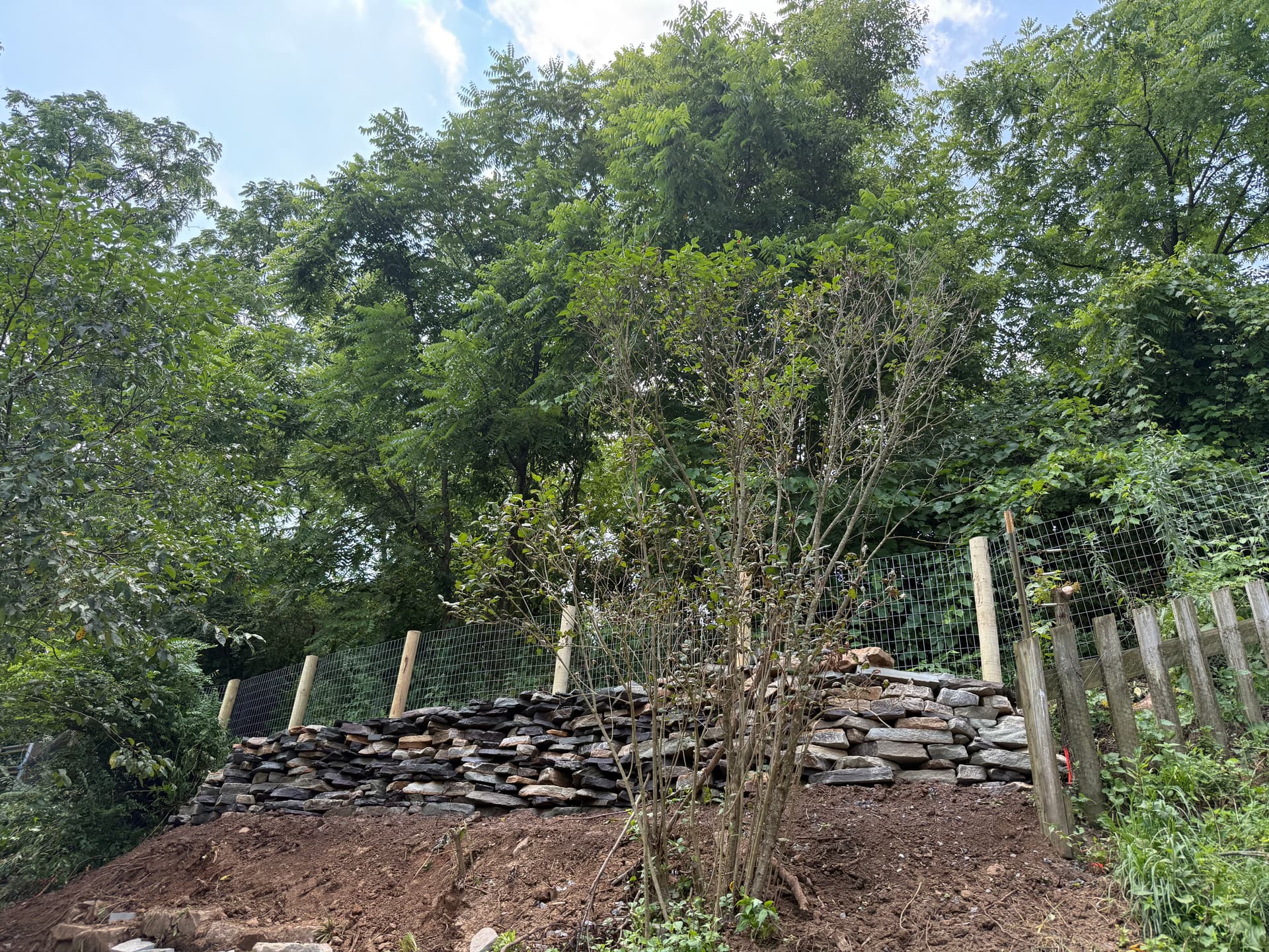 Gallery photos for Natural Stone Retaining Wall Built to Hold and Drain Right: Image #6