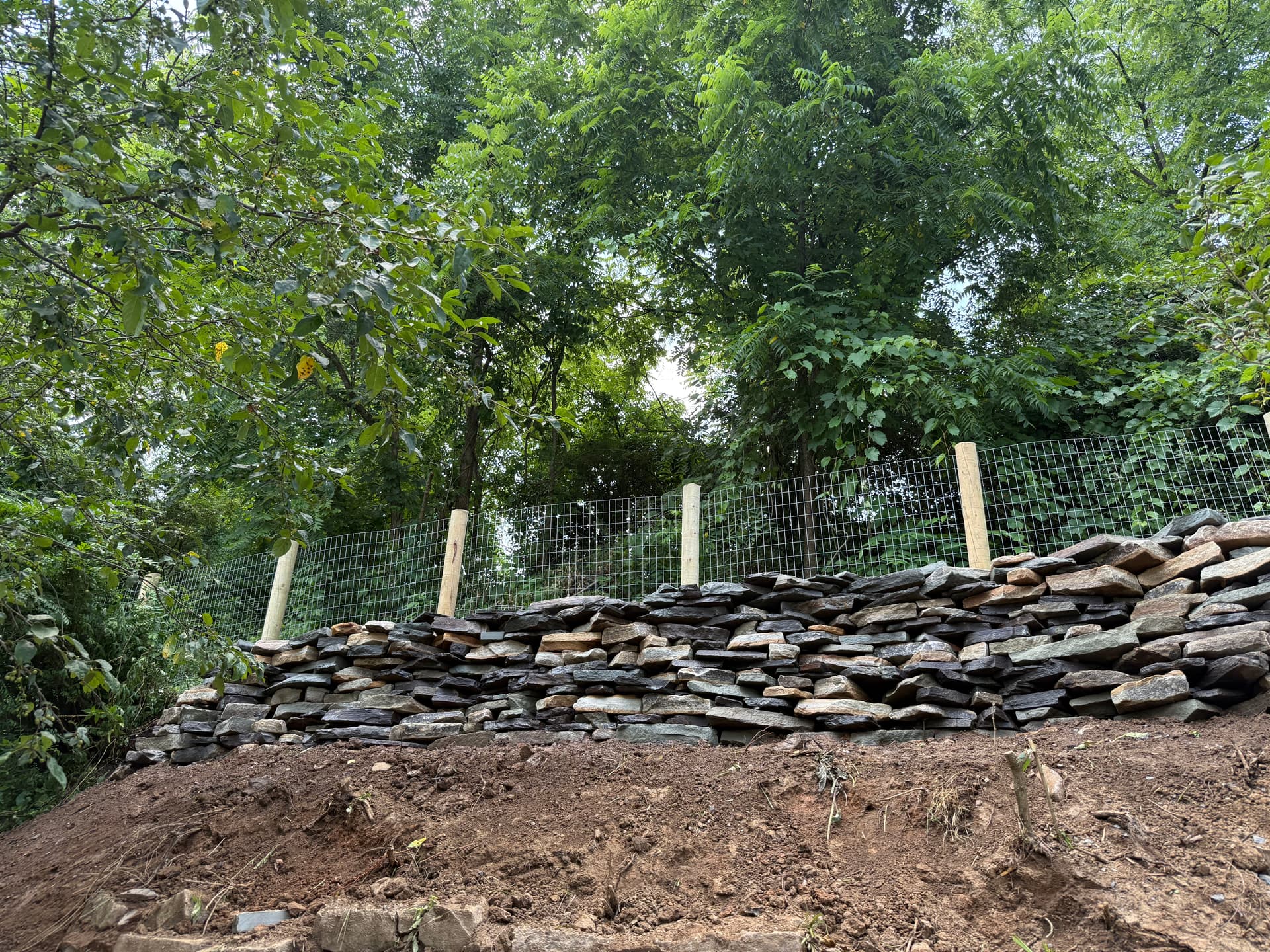 Gallery photos for Natural Stone Retaining Wall Built to Hold and Drain Right: Image #7