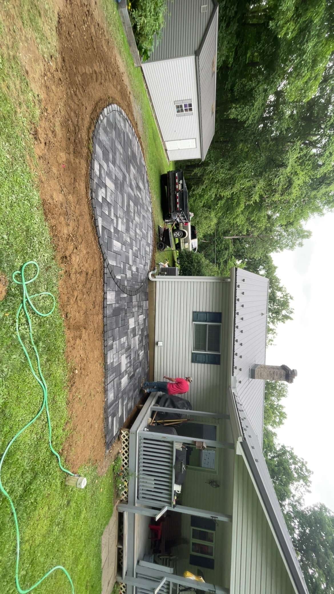 Paver Patio With a Built-In Firepit Space Done Right image