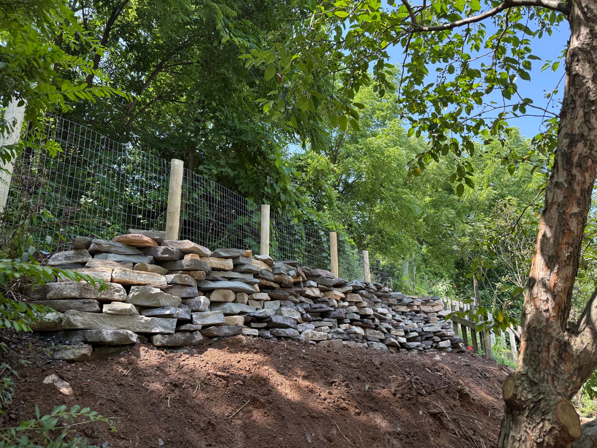 Gallery photos for Natural Stone Retaining Wall Built to Hold and Drain Right: Image #9