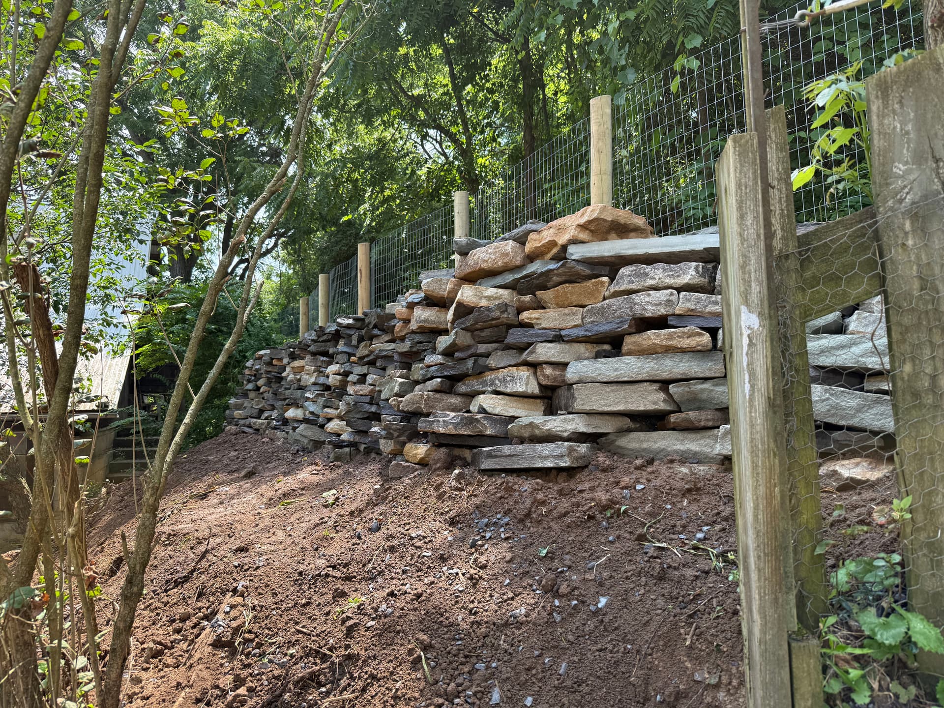 Gallery photos for Natural Stone Retaining Wall Built to Hold and Drain Right: Image #2
