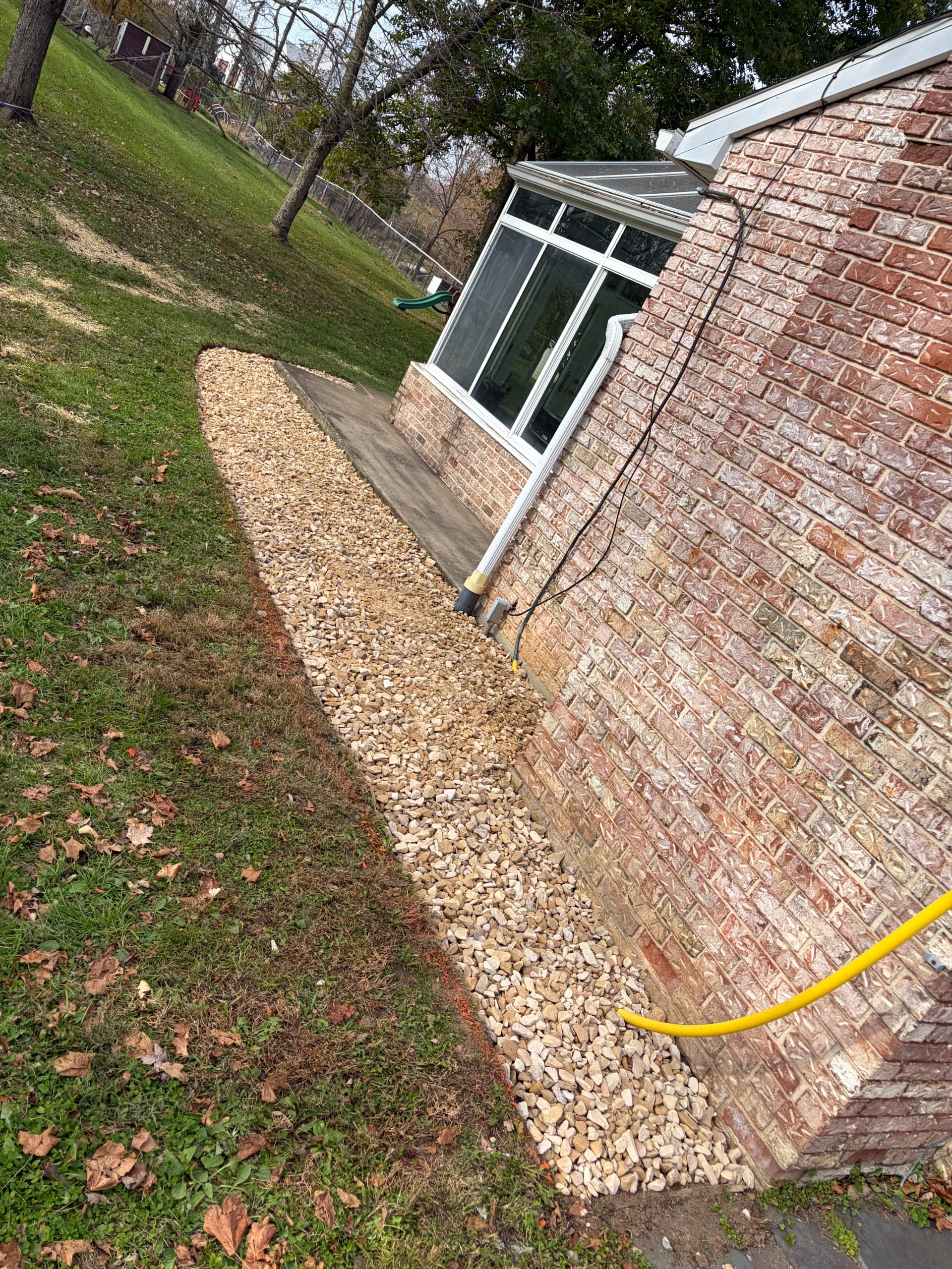 Gallery photos for Stone Bed Installation That Cleans Up the Foundation: Image #2